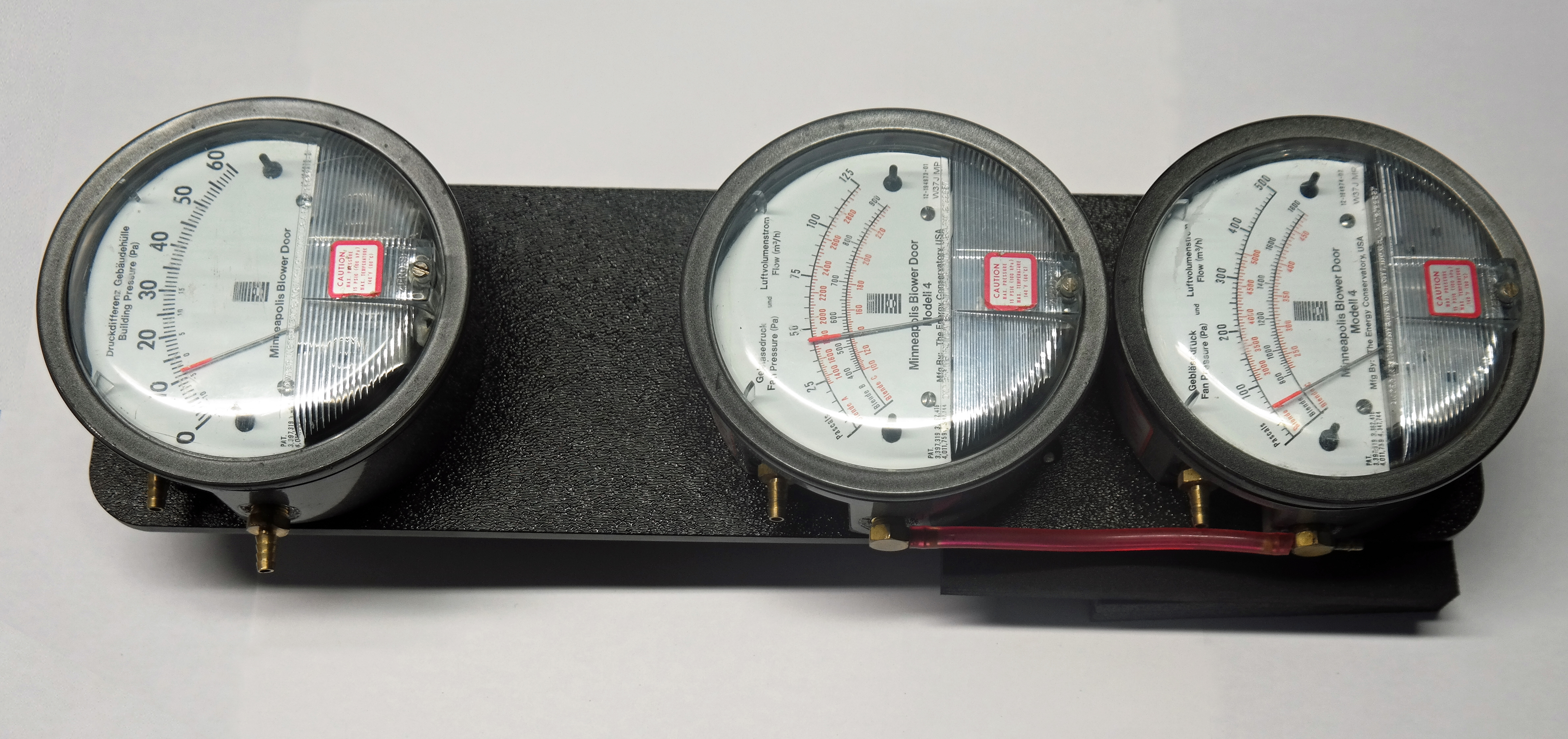 Manufacturer's calibration of the analog pressure gauges